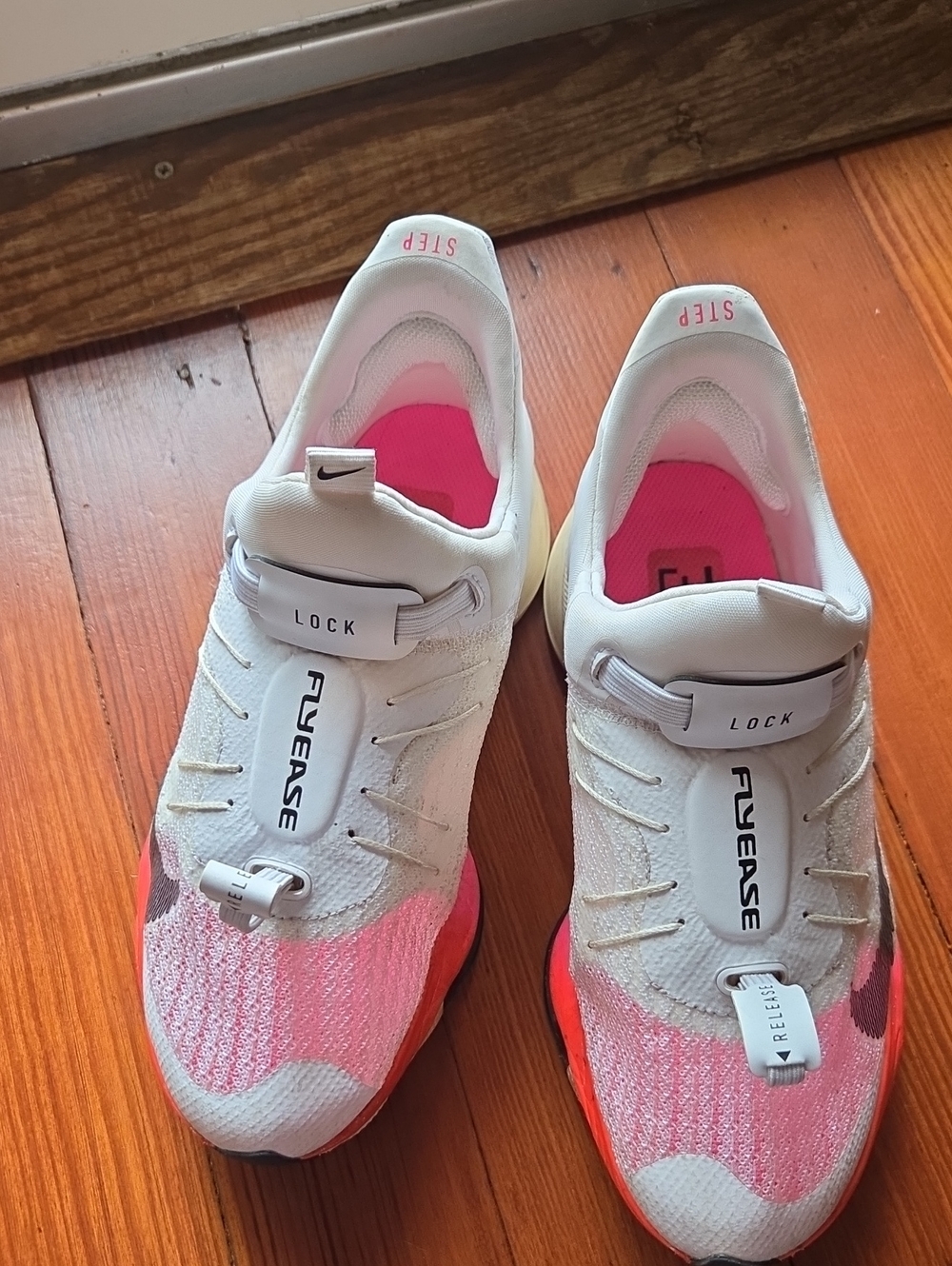 NIKE Women's White and Pink Lock-Closure Running Shoes